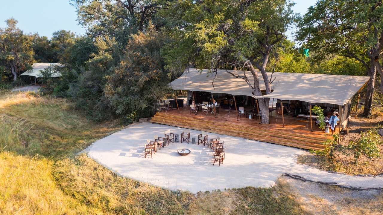 Aerial shot of main lodge and campfire site of the Okavango Explorers Camp in the Okavango Delta, Botswana.