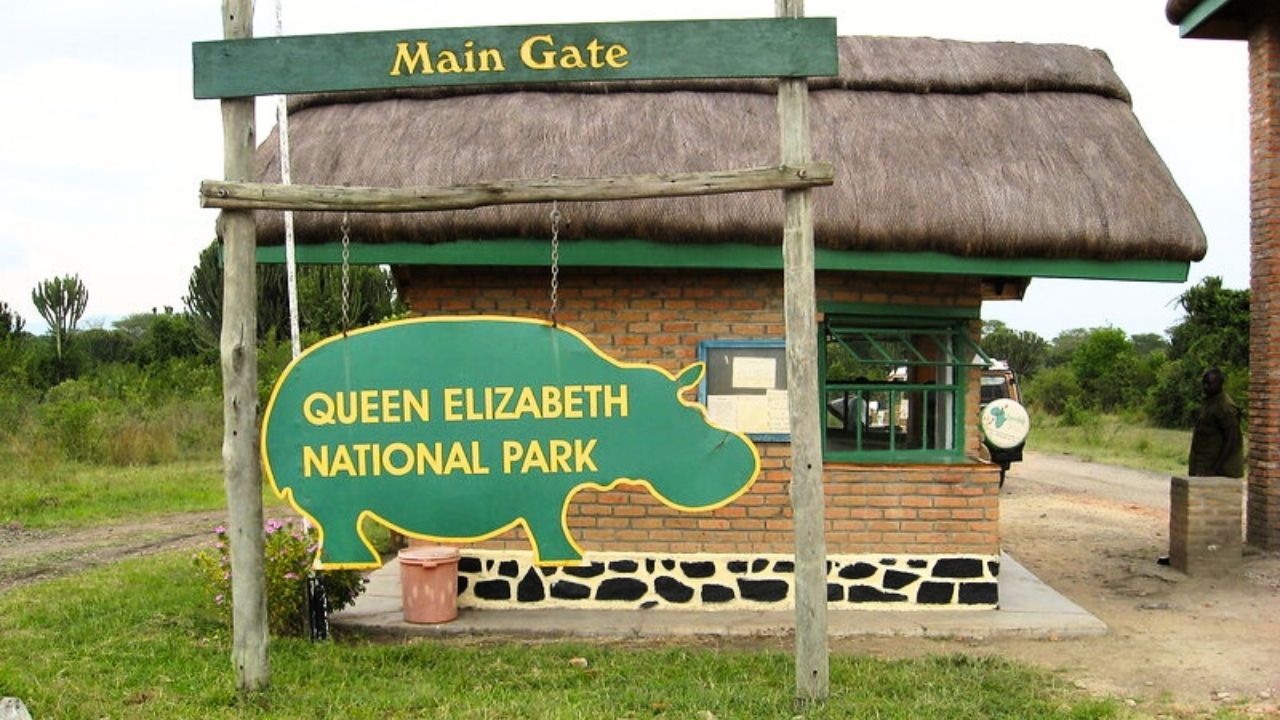 Entrance gate to Queen Elizabeth National Park with hippo sign