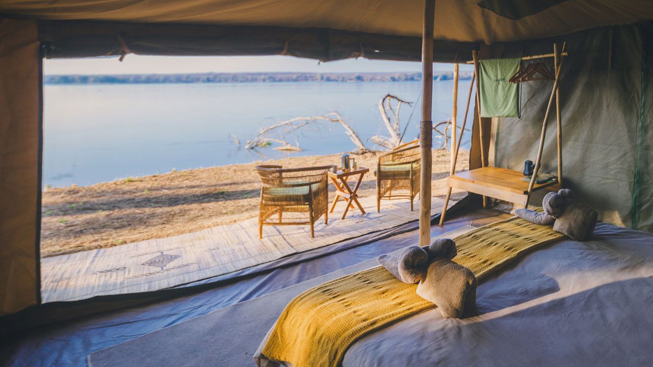 View from a guest suite over the lake at Kutali Safari Camp, Lower Zambezi National Park, Zambia.