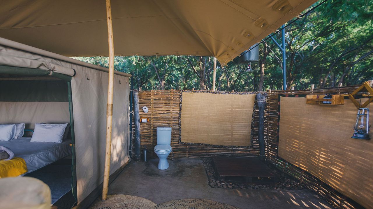 Bathroom inside a tented accommodation at Kutali Safari Camp, Lower Zambezi National Park, Zambia.