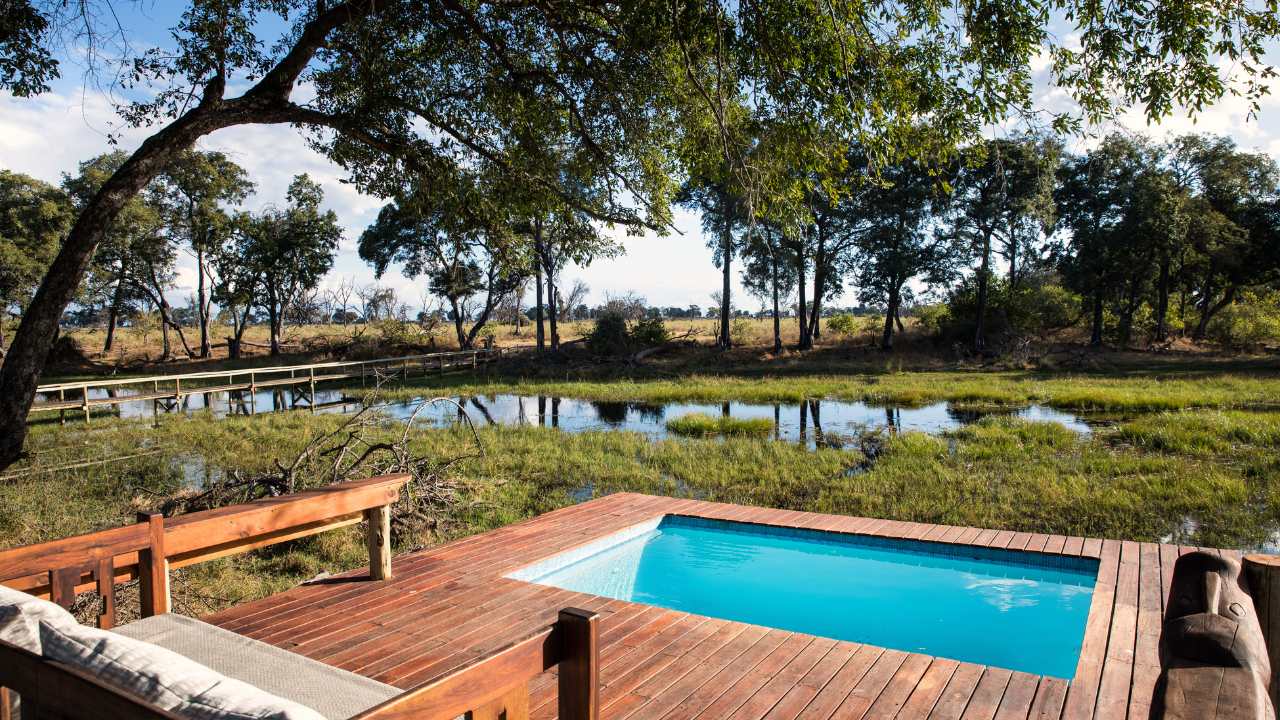 Private plunge pool overlooking wetlands at Duba Explorers Camp, Okavango Delta, Botswana.