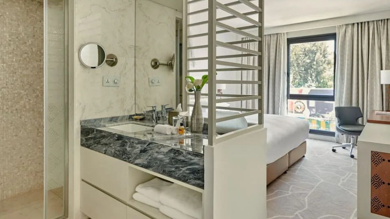 Modern bathroom with view through bedroom at Hyatt Regency Addis Ababa