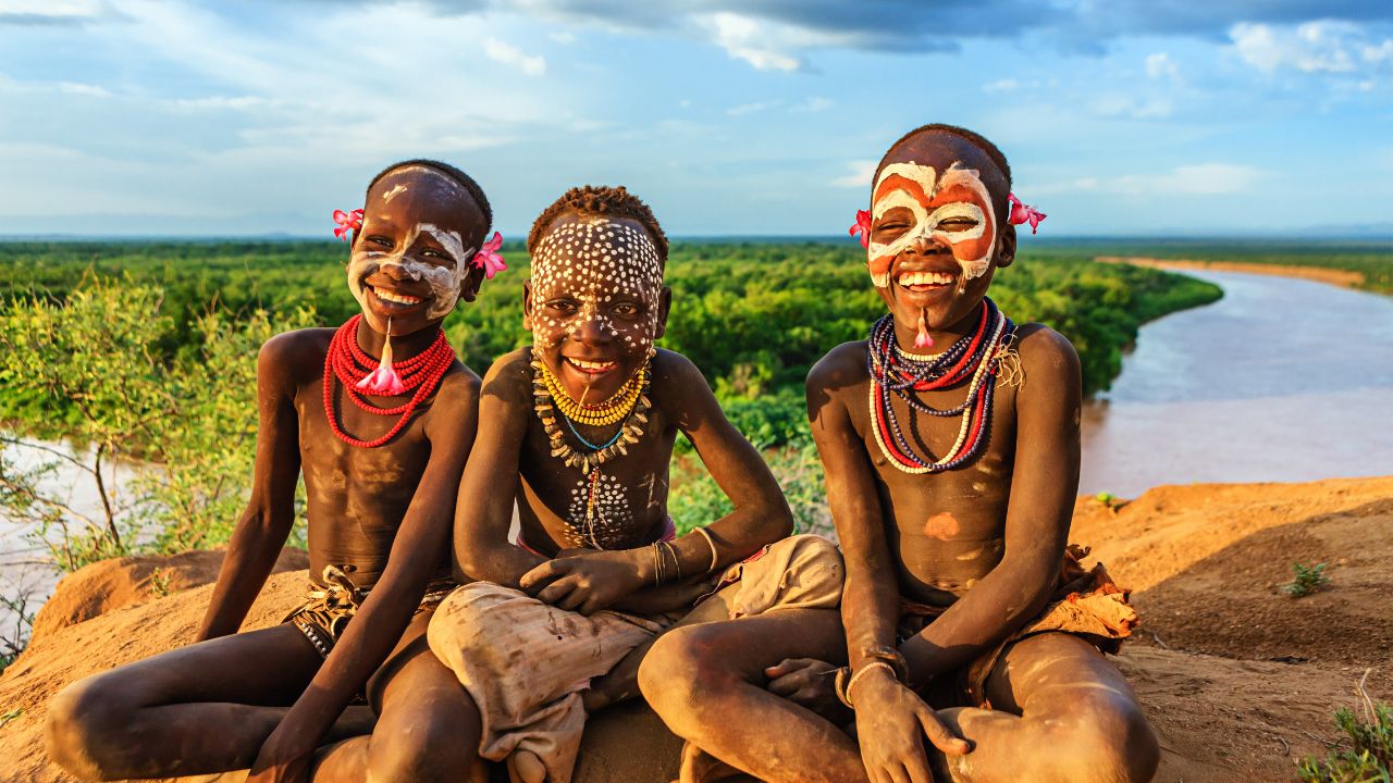 Ethiopian children painted in traditional tribal colors