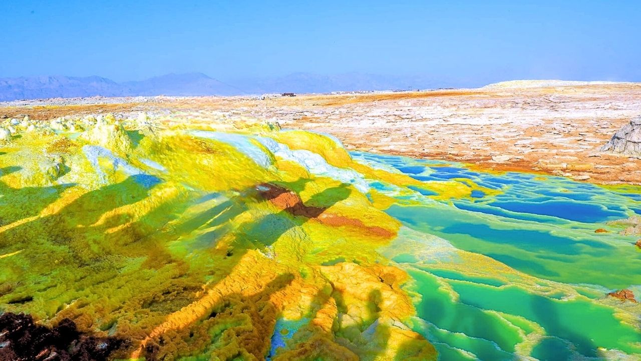 Vibrant Danakil Depression landscape with blue sky, Ethiopia