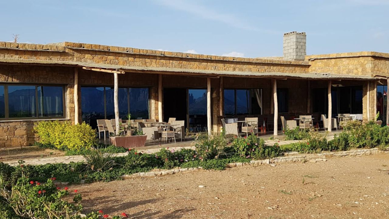 Front view of Korkor Lodge with sandy foreground, Gheralta Ethiopia