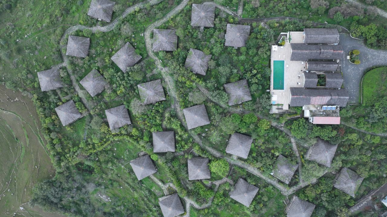 Top-down aerial of Mezena Lodge with pool and villas, Ethiopia