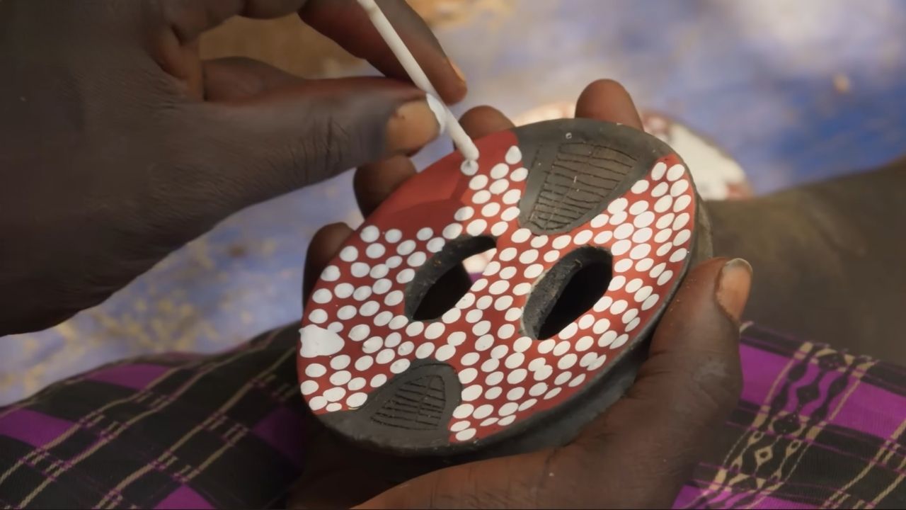 Close-up of colorful painted lip plate Omo Valley tribe