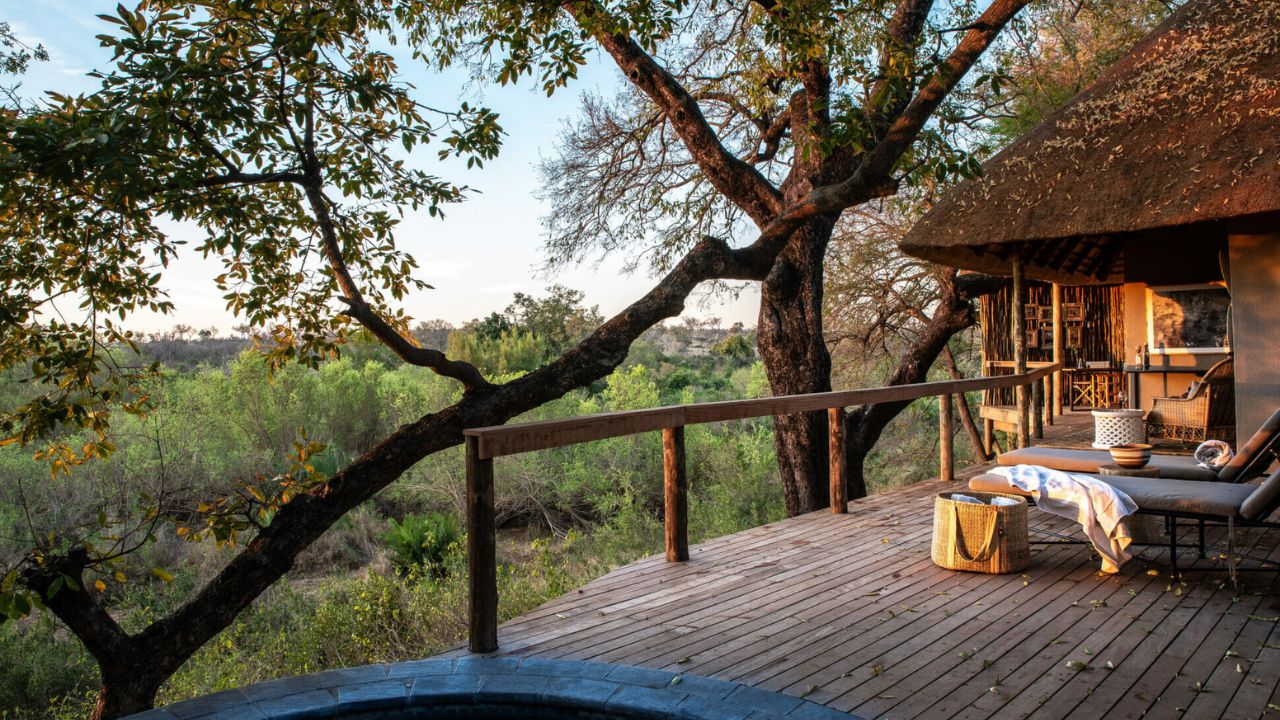 Private deck with plunge pool overlooking bush at Londolozi Varty Camp