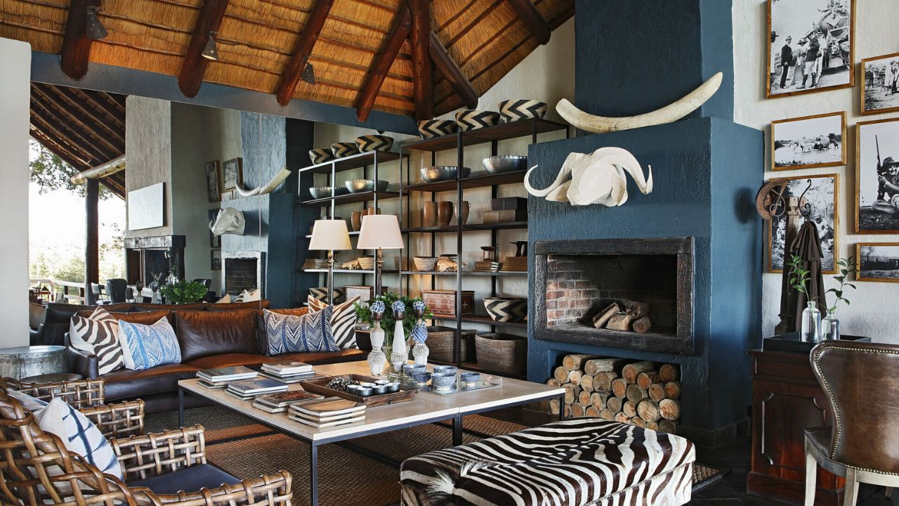Londolozi main reception with blue fireplace and zebra skin lounge chairs
