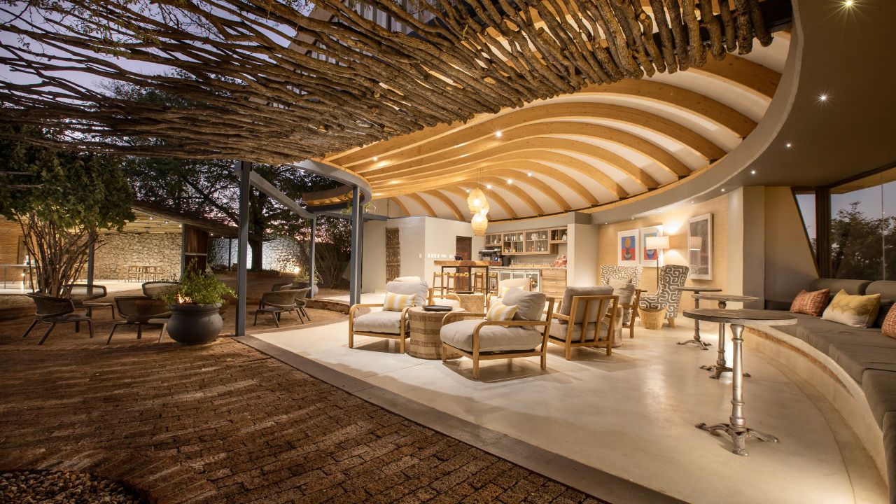 Modern African architecture in main lodge reception with wide views of desert