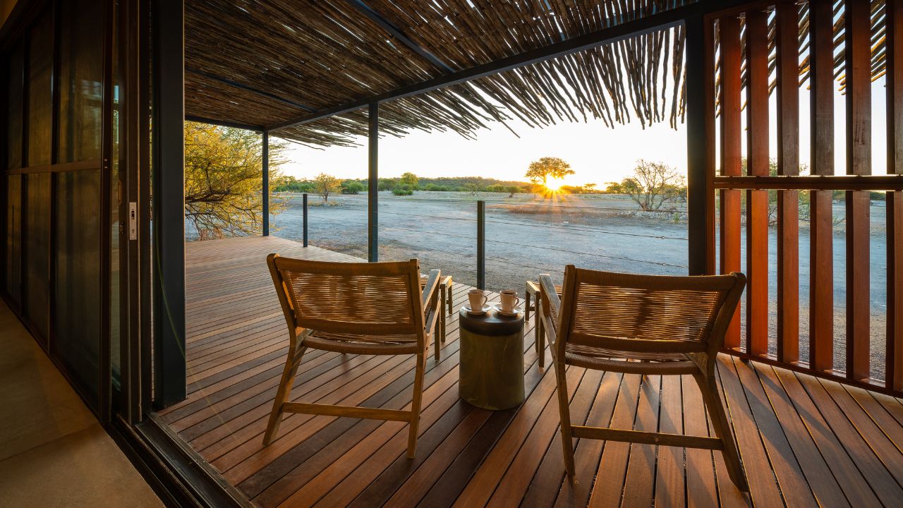 View from guest suite deck at sunset over Namibian desert