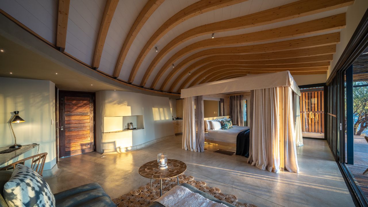 Guest room side view with lounge area and modern African décor