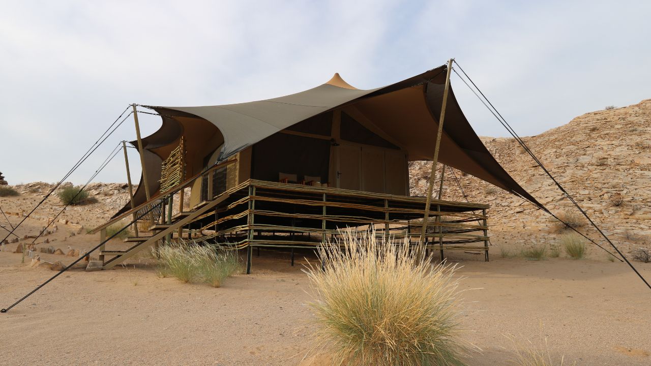 Front view of luxury tented guest accommodation with private deck
