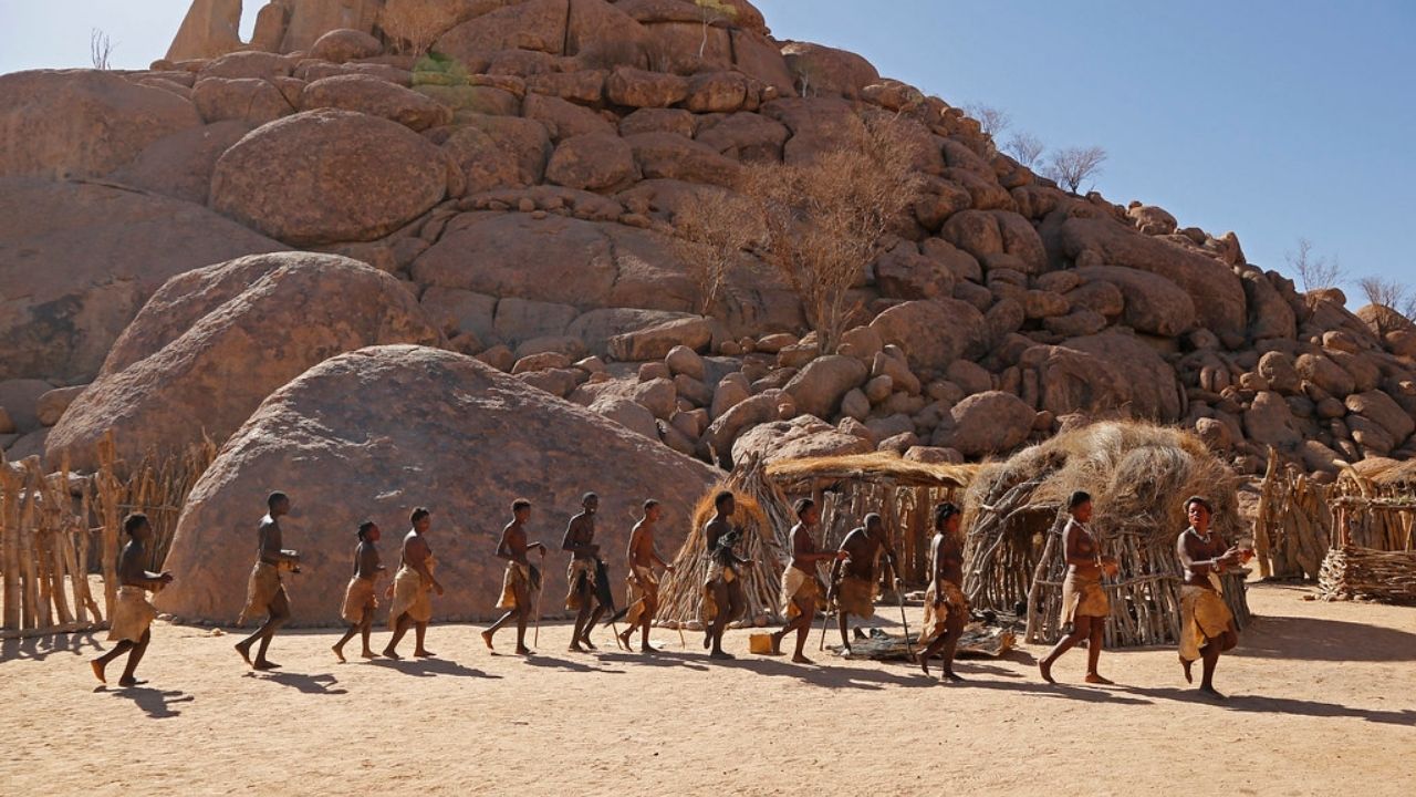 Himba tribal gathering for celebration in village, Namibia