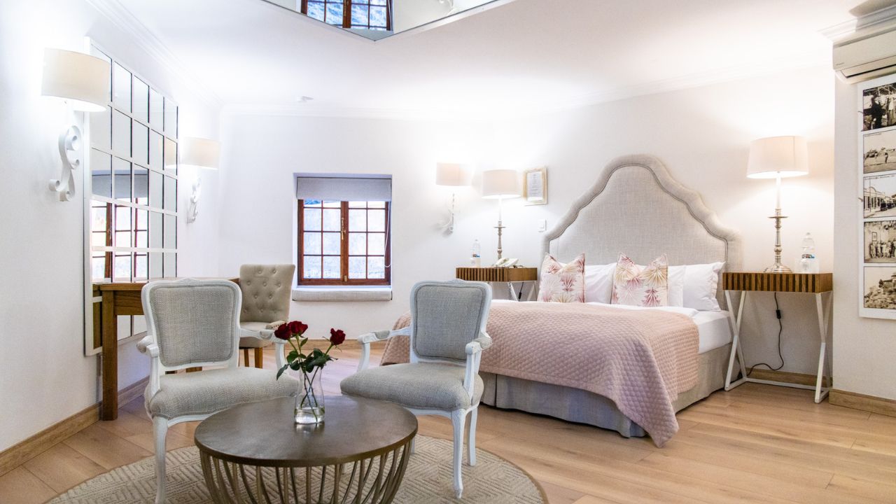 Comfort double room at Heinitzburg Boutique Hotel with spacious layout and double bed
