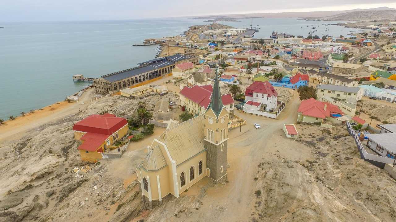 Old town buildings in Lüderitz, Namibia, showcasing colonial-era architecture.