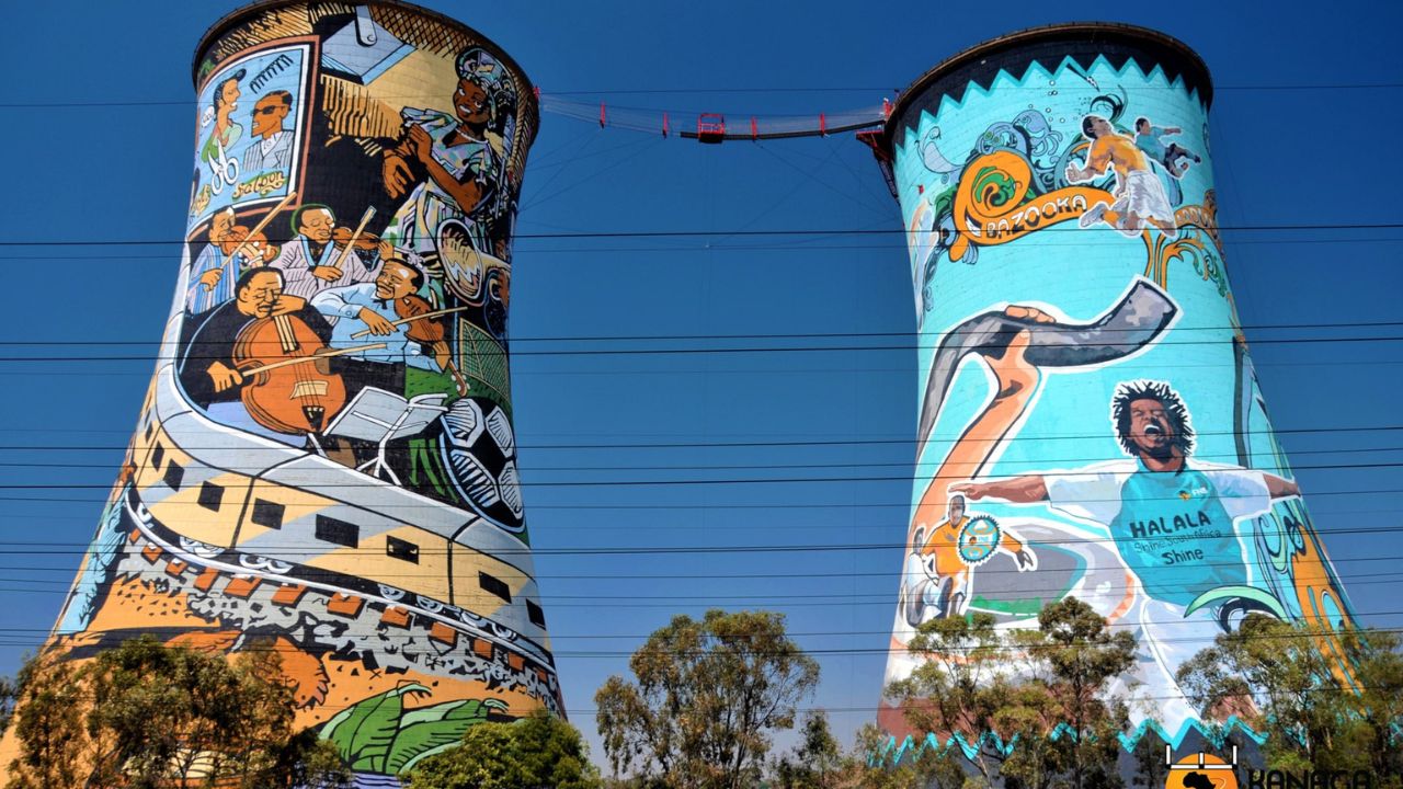Two Soweto cooling towers painted with African art