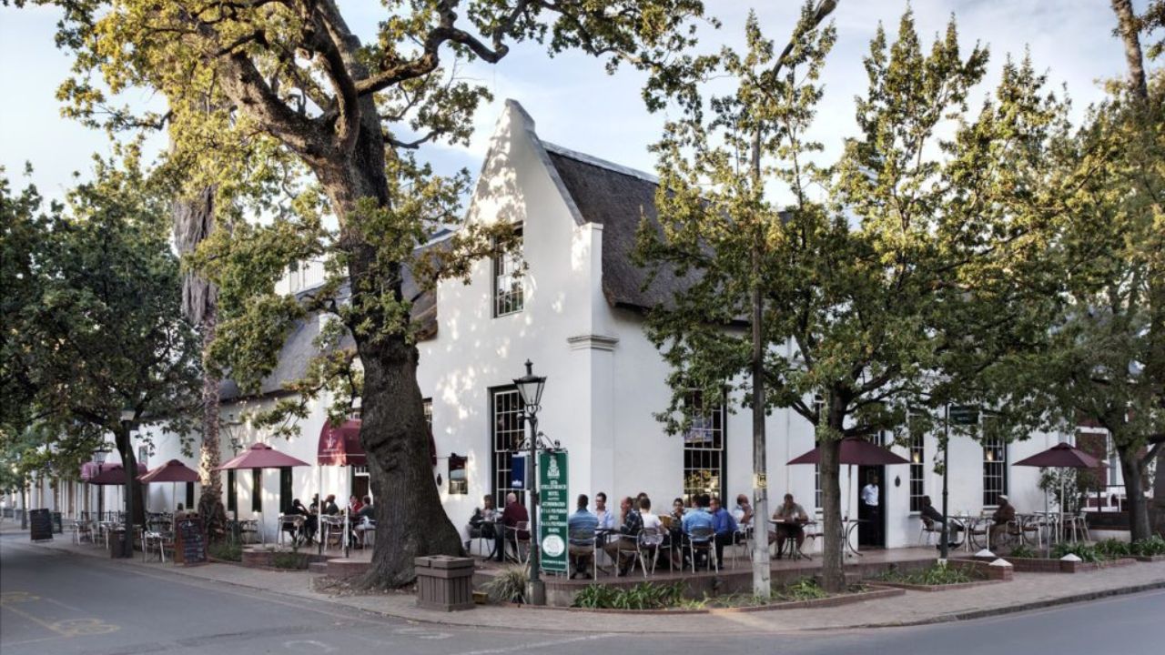 Cape Dutch style building in café setting, Stellenbosch
