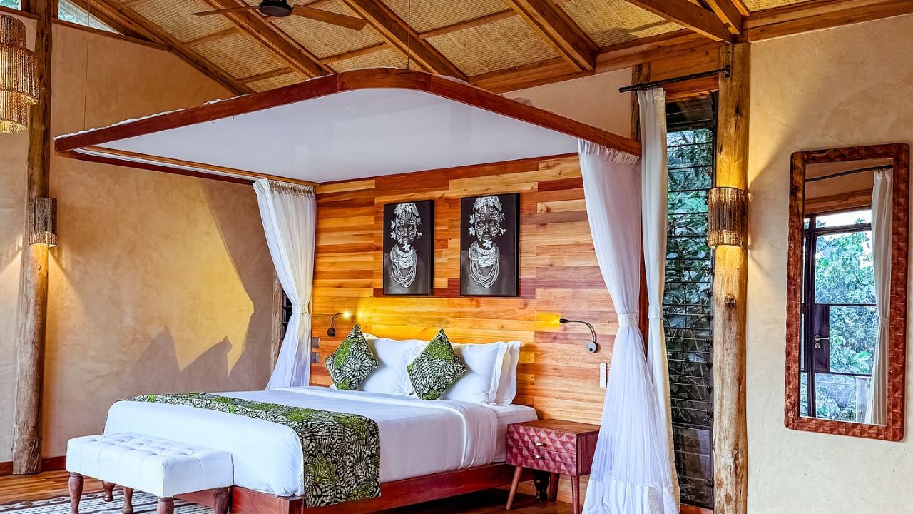 Side view double bed luxury room Entebbe Forest Lodge Uganda