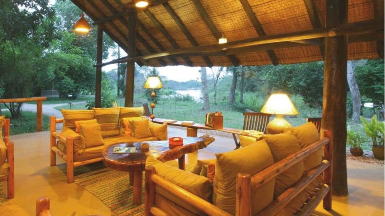 Reception lounge thatch roof Ishasha Wilderness Camp Uganda