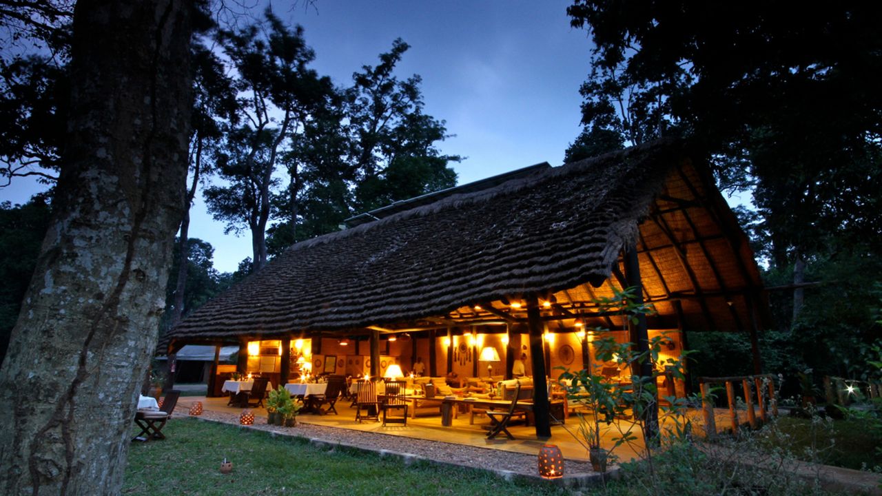 Dining area at dusk Ishasha Wilderness Camp Uganda