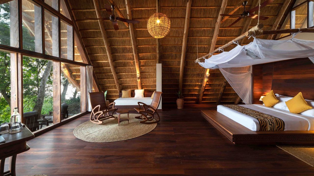 Luxury guest suite with large windows overlooking the Nile River