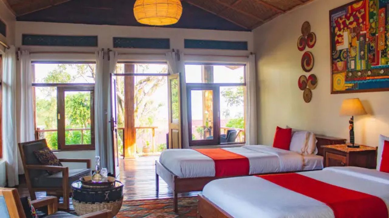 Double room with balcony doors Nkuringo Bwindi Gorilla Lodge