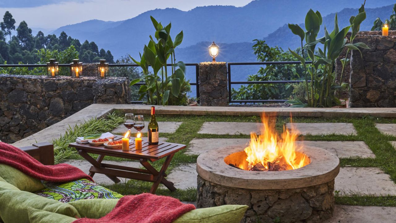 Outdoor seating with boma fire Nkuringo Bwindi Gorilla Lodge
