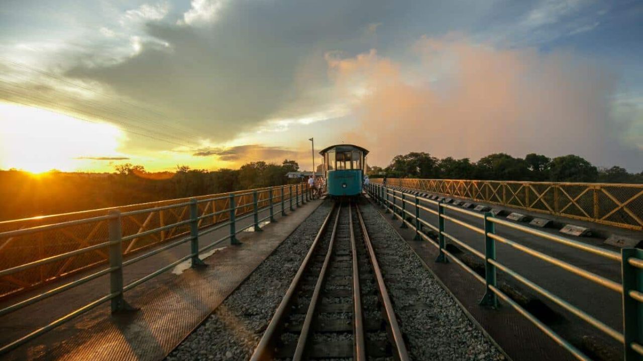 Bamba Tram crossing Victoria Falls Bridge Zimbabwe vintage train
