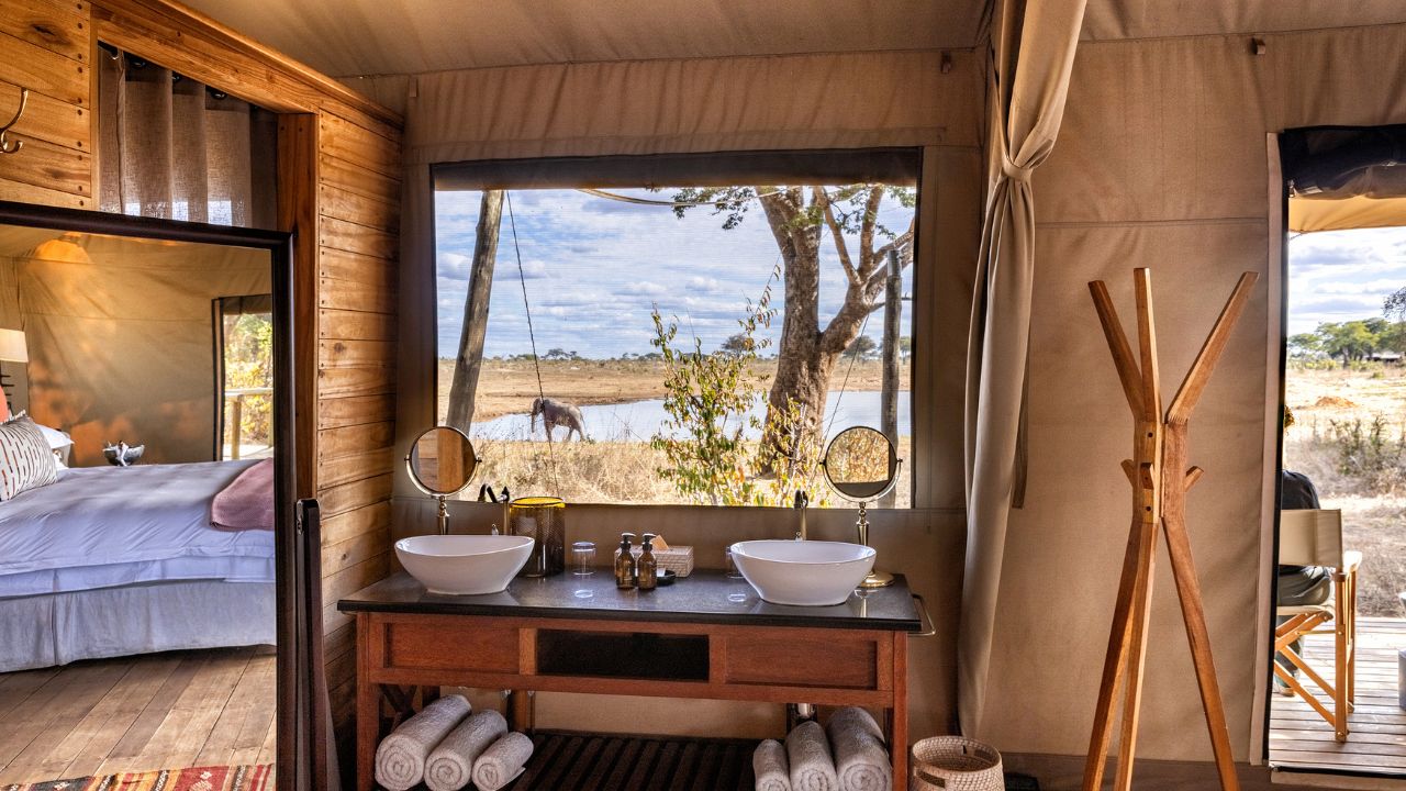 Bathroom basins with river view and elephant in distance, Verneys Camp