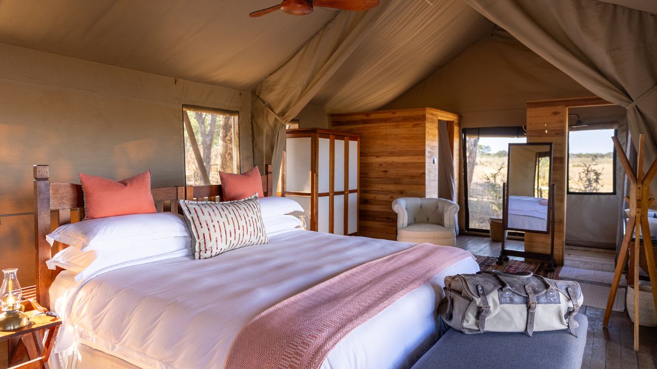 Luxury double bed in Verneys Camp tented suite, Hwange