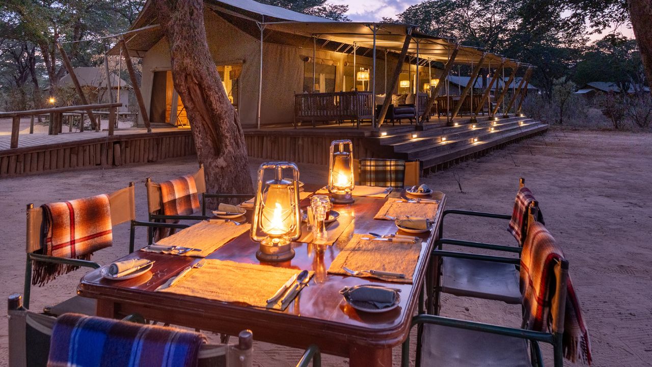 Evening dining at Verneys Camp lodge, candlelit Hwange National Park