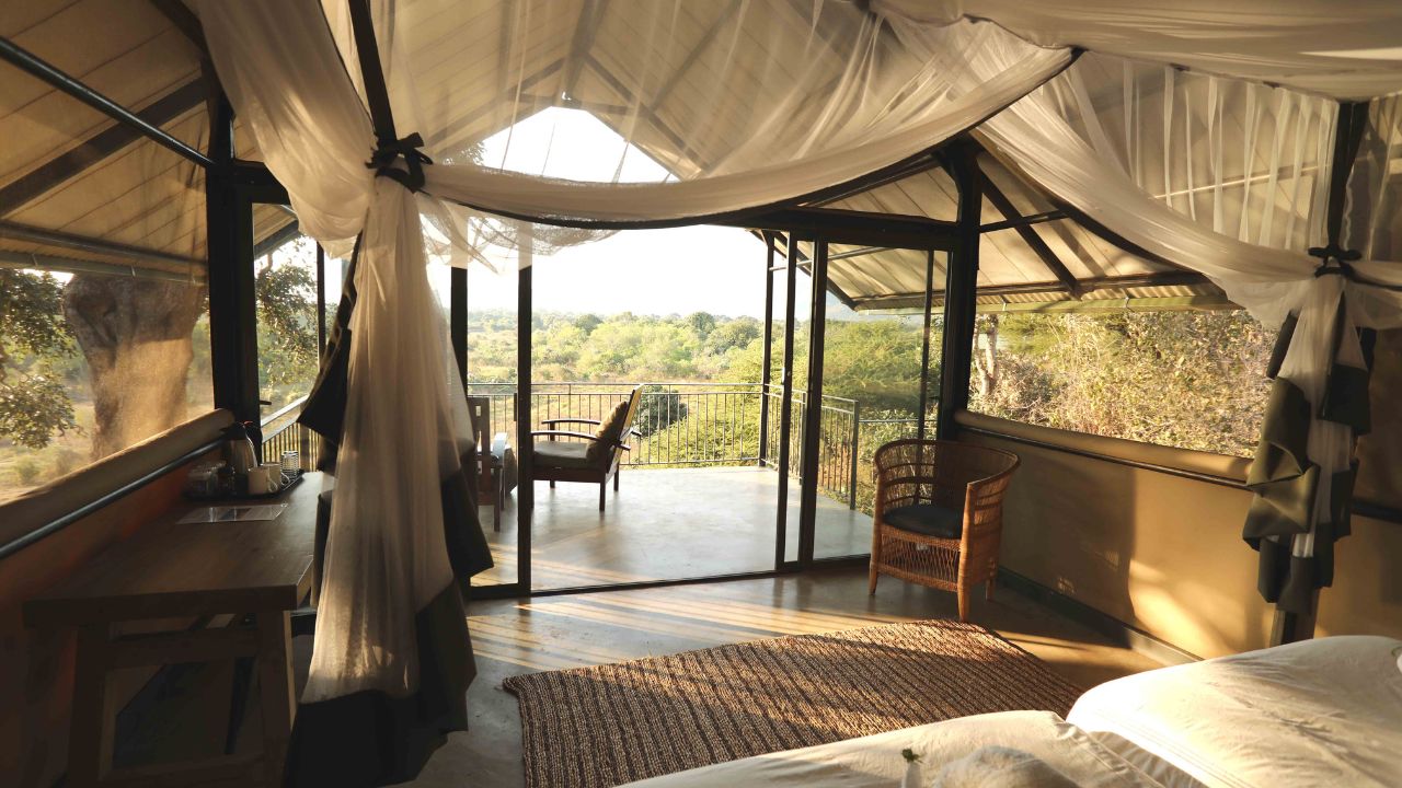 Guest room deck view overlooking African bush, Kavinga Lodge