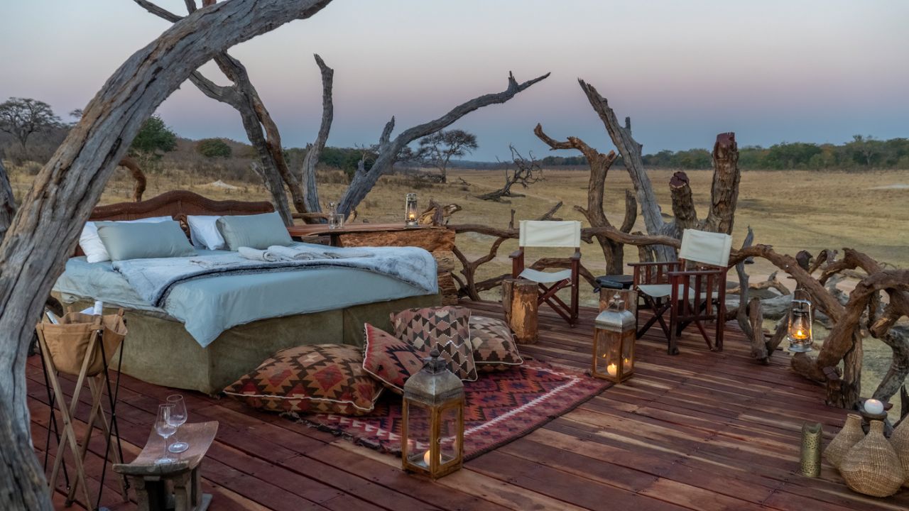 Lazy bed setup on deck at Khulu Bush Lodge for sundowner drinks sunset