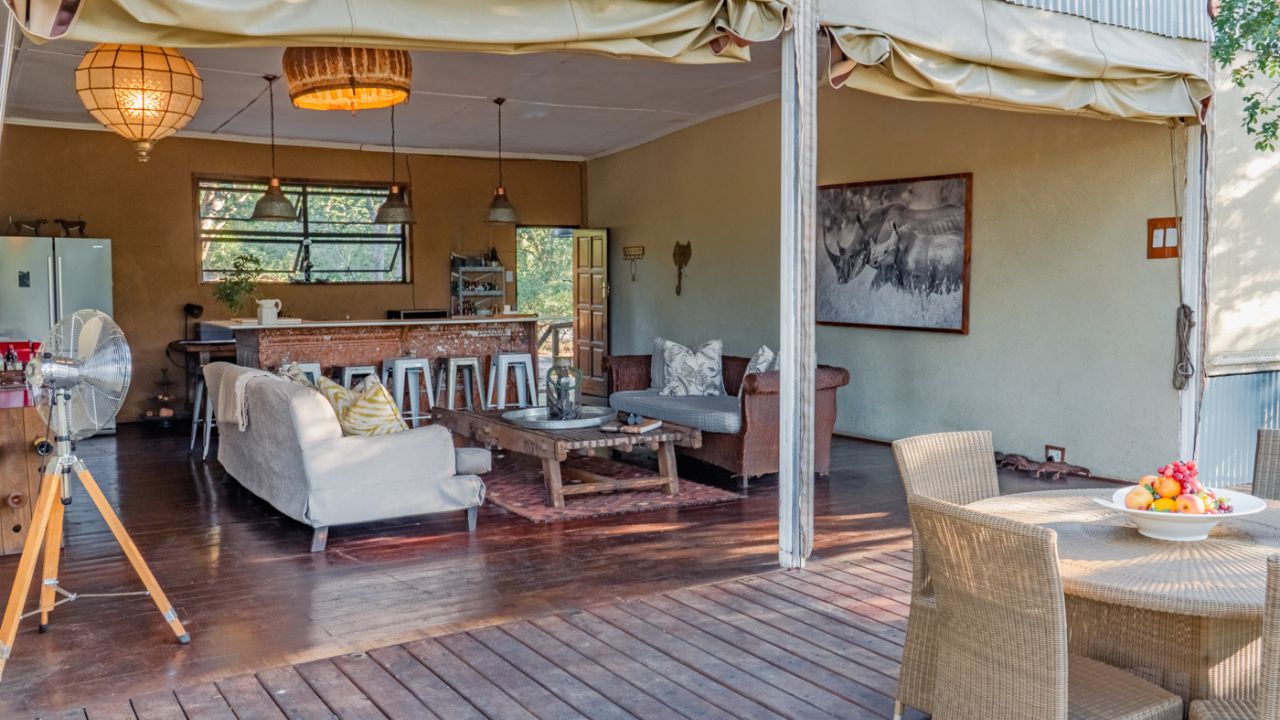 Bar and lounge area at Kulu Bush Camp with spacious outdoor deck