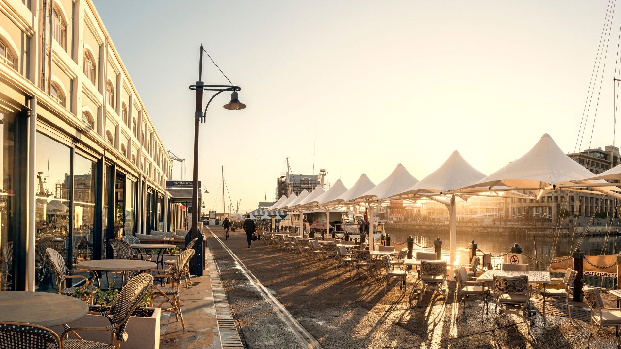 Queen Victoria Hotel exterior at sunrise with Table Mountain Cape Town.