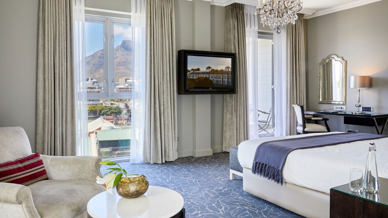 Junior suite rear view with TV and Table Mountain seen from window.