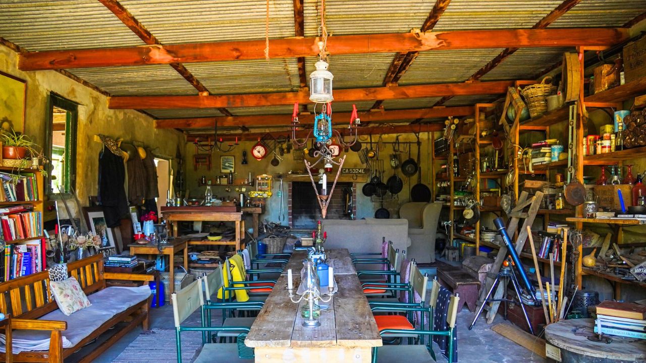Rustic dining area and traditional South African kitchen at Bakkrans.