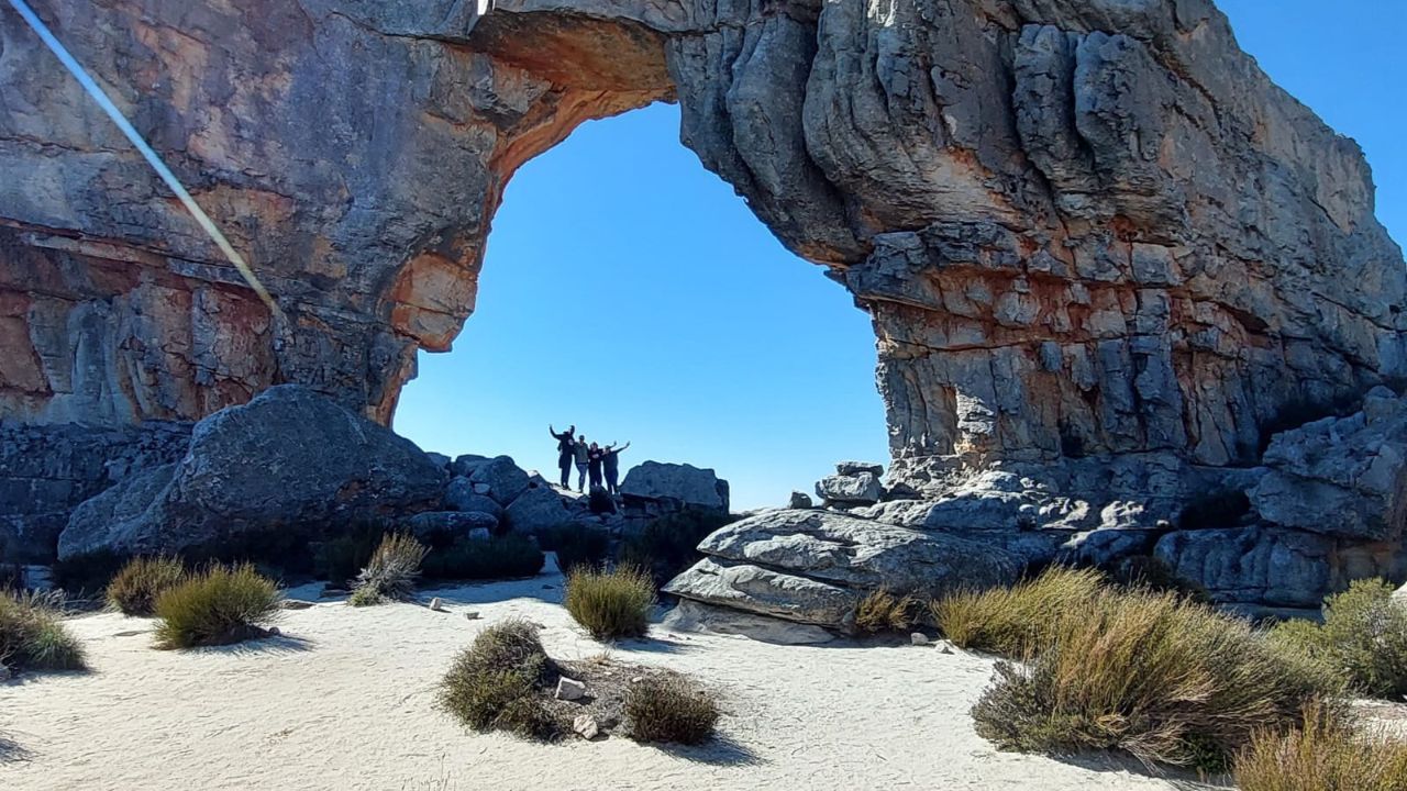 Hole in the Wall rock formation with sunlight shining through Cederberg.