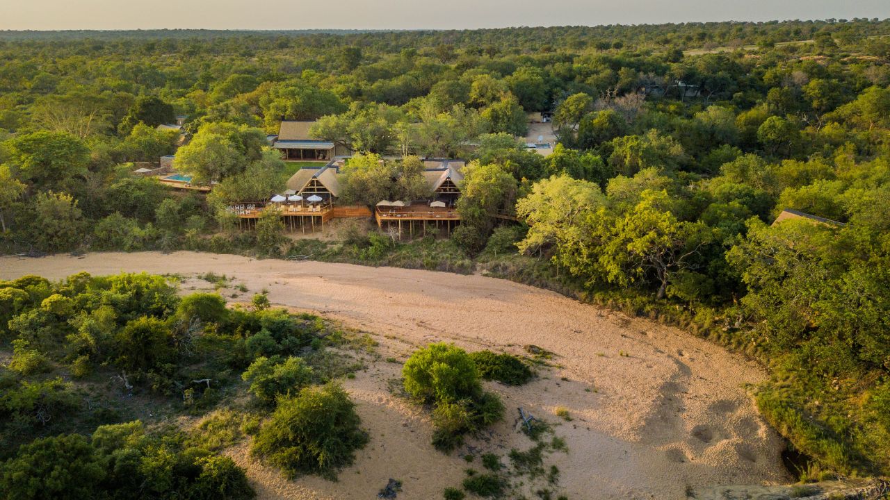Aerial view Thornybush lodge with riverbed foreground Greater Kruger.
