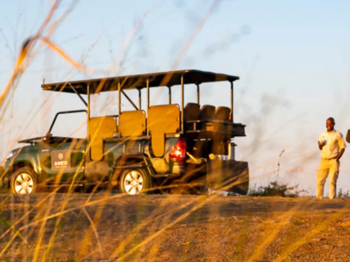 Safari game vehicle viewing wildlife near Hluhluwe South Africa.