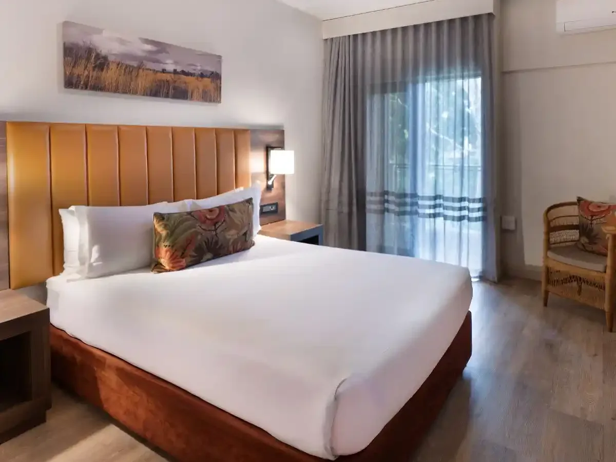 Modern double room with balcony at ANEW Hotel Hluhluwe South Africa.