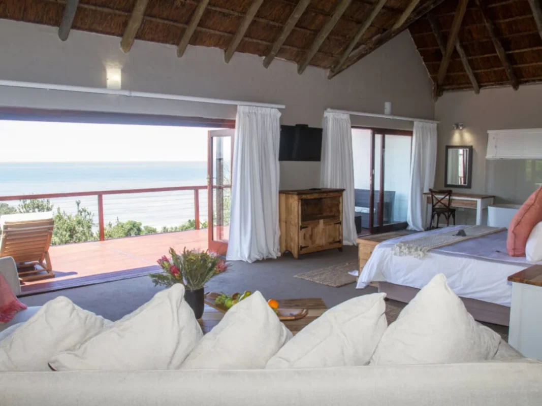 Double room with ocean view and balcony at Crawford's Beach Lodge.