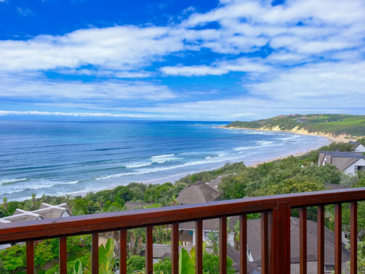 Deck overlooking Crawford's Beach Lodge and Wild Coast ocean.
