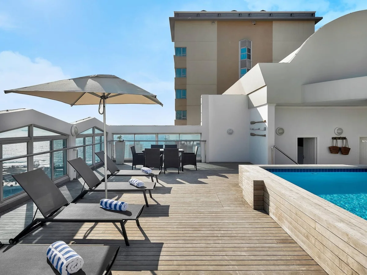 Swimming pool and outdoor deck at Protea Hotel Fire & Ice Durban Umhlanga Ridge.
