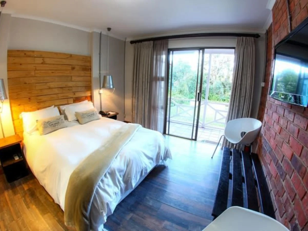 Double room with balcony at Tsitsikamma Village Inn South Africa.