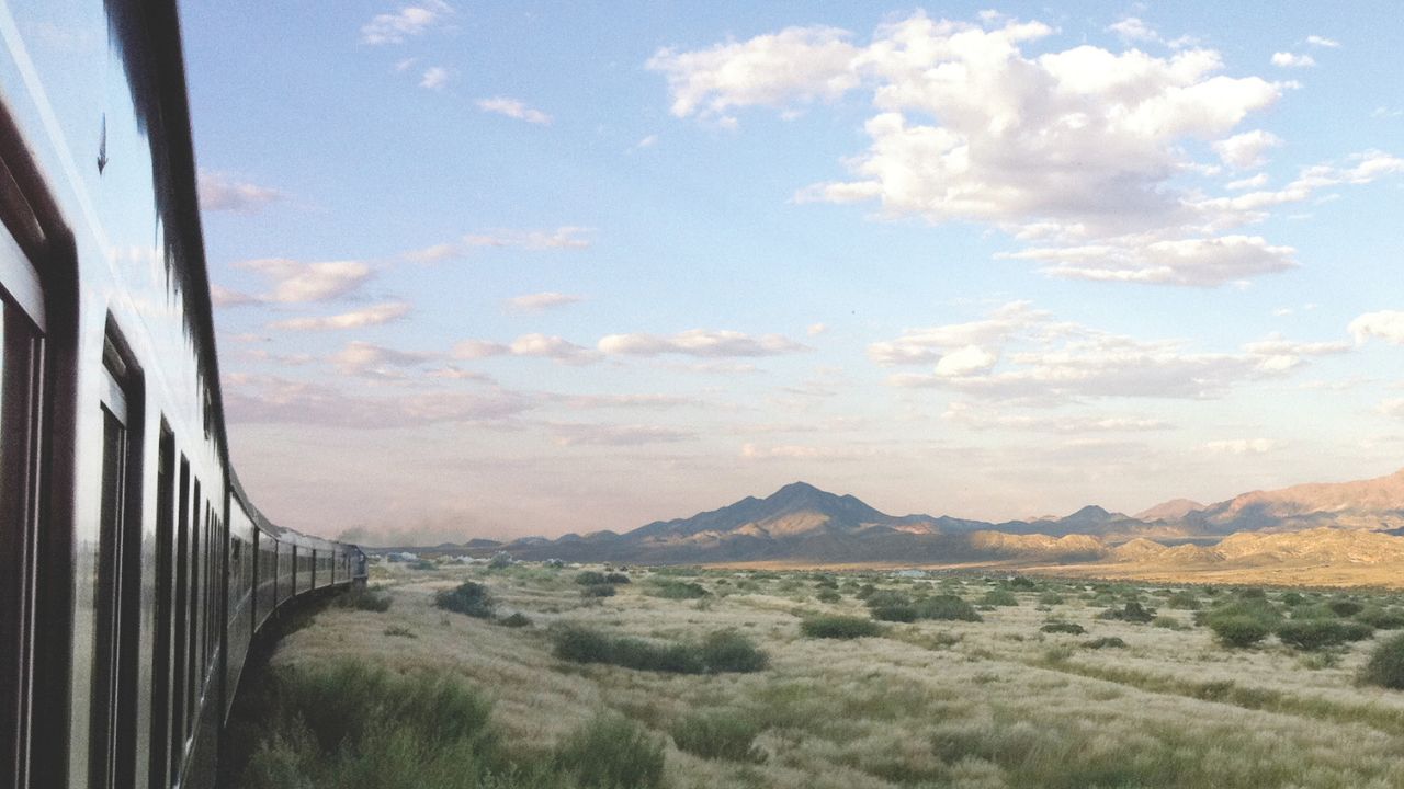 Rovos Rail travelling through Namibia's semi-desert landscape towards South Africa.